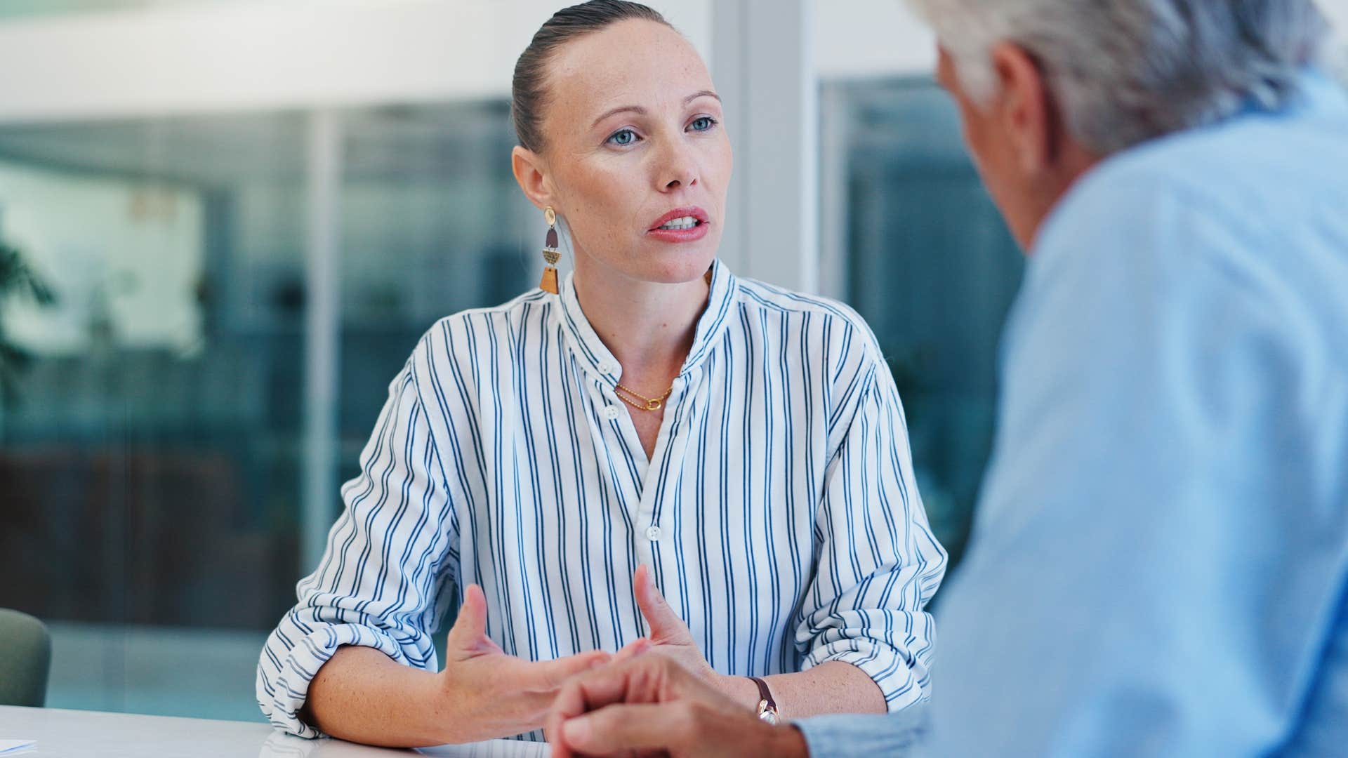 woman saying they're probably exaggerating at work