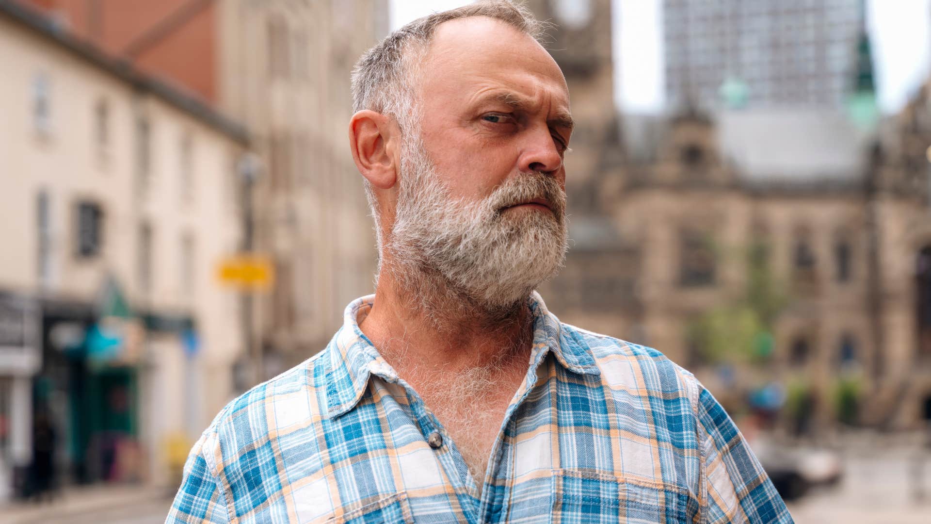 man who struggles with boundaries looking annoyed outside