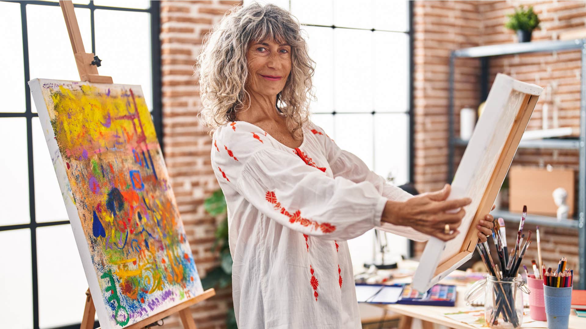 highly creative woman painting