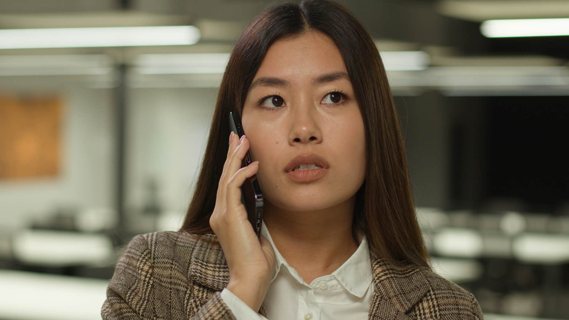 woman who feels forced to perform talking on the phone