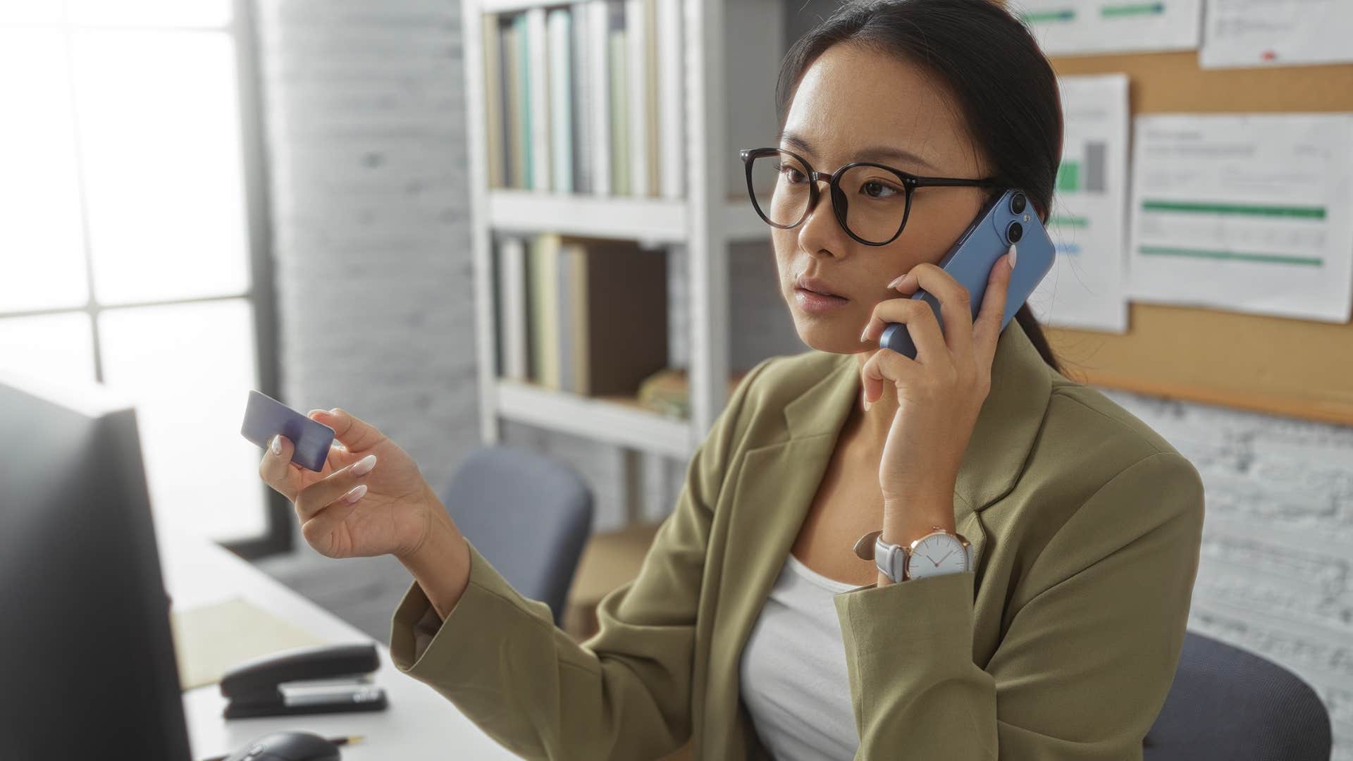 woman on the phone being guilt-tripped into visiting parents