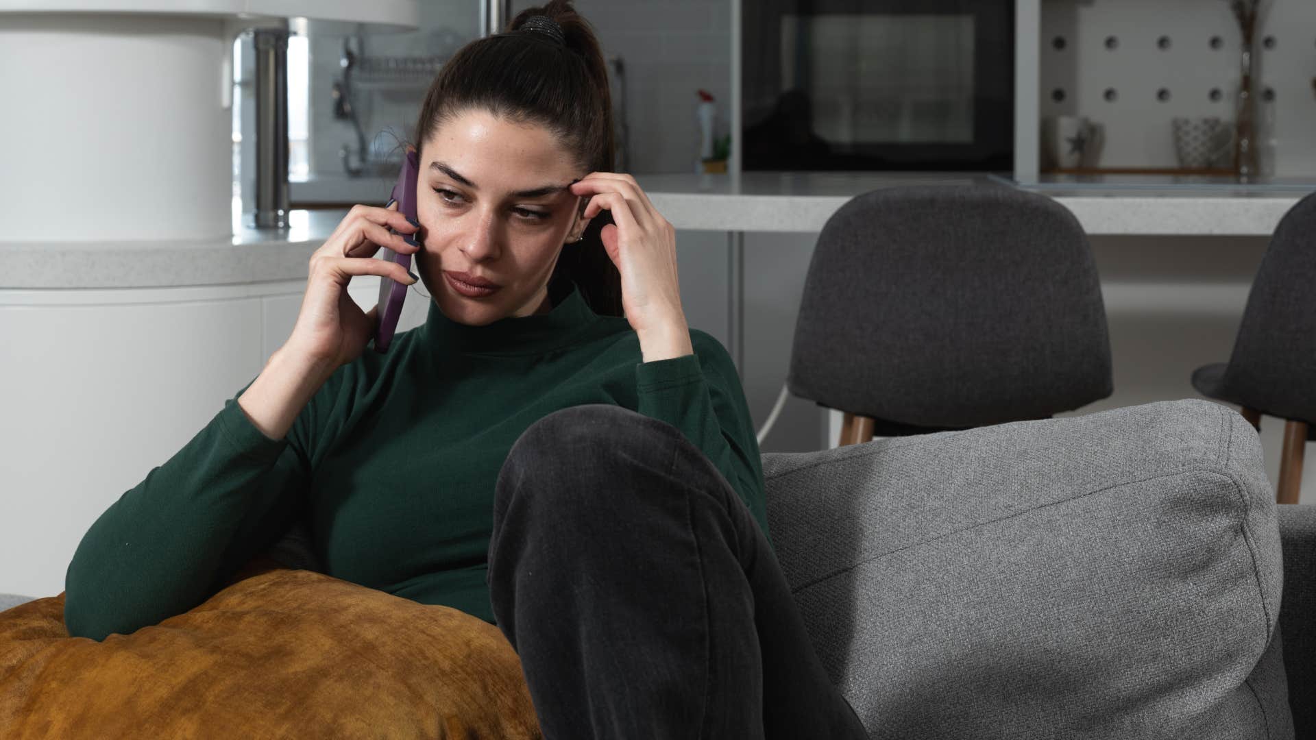 woman on the phone with chronically negative parents