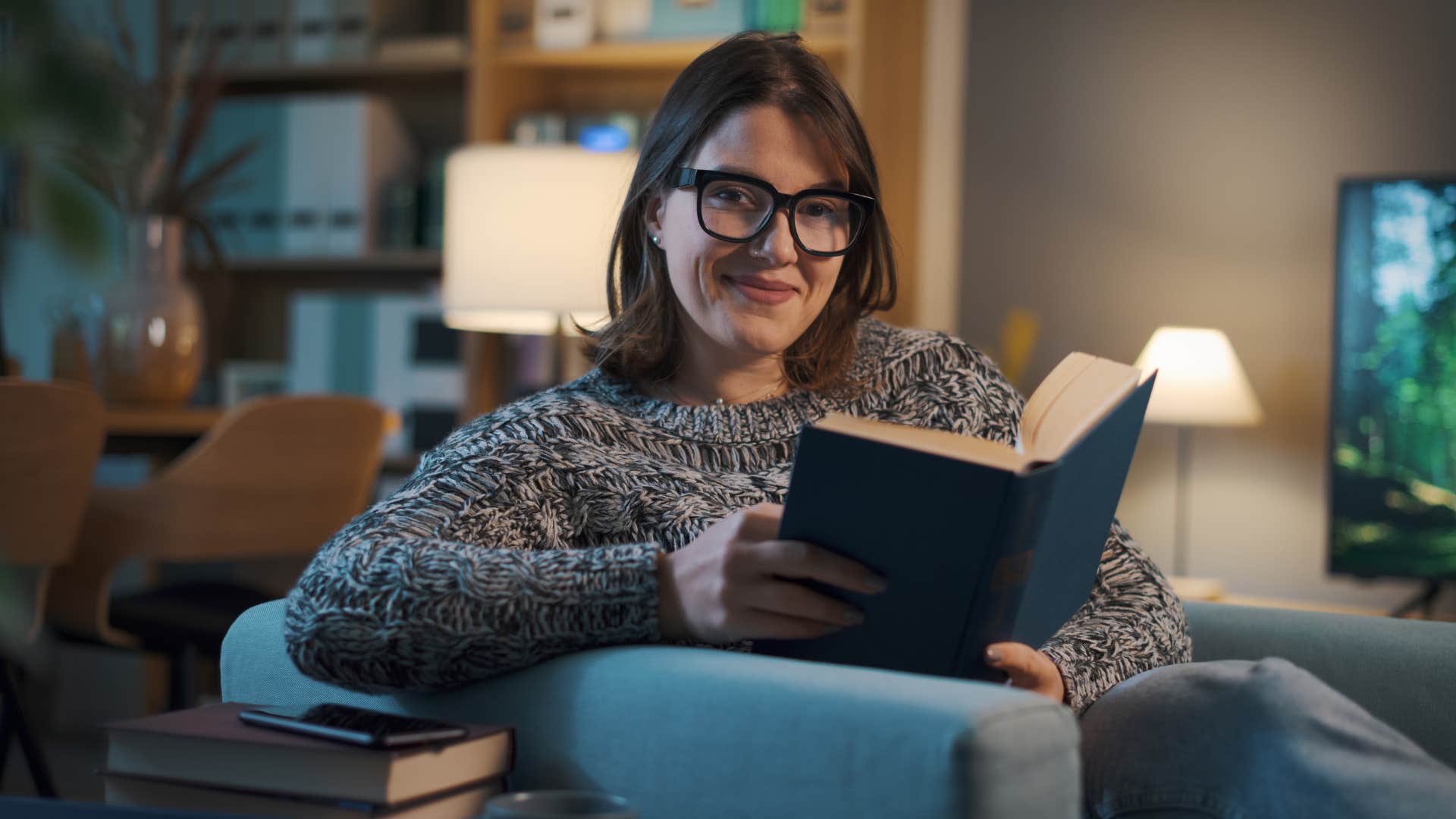 woman protecting her peace reading at home