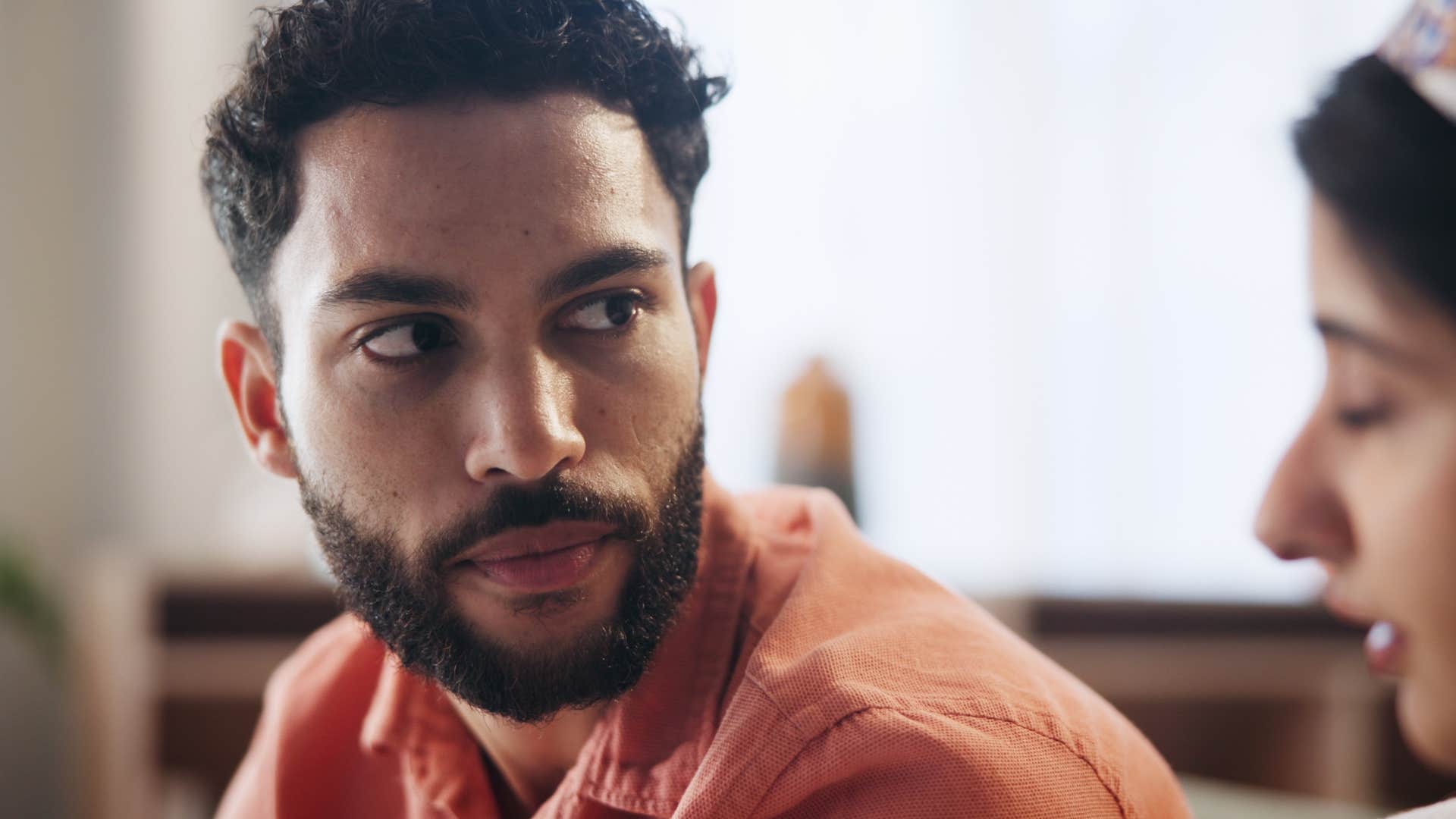 woman talking to a man who knows you lose a lot of people when you choose yourself