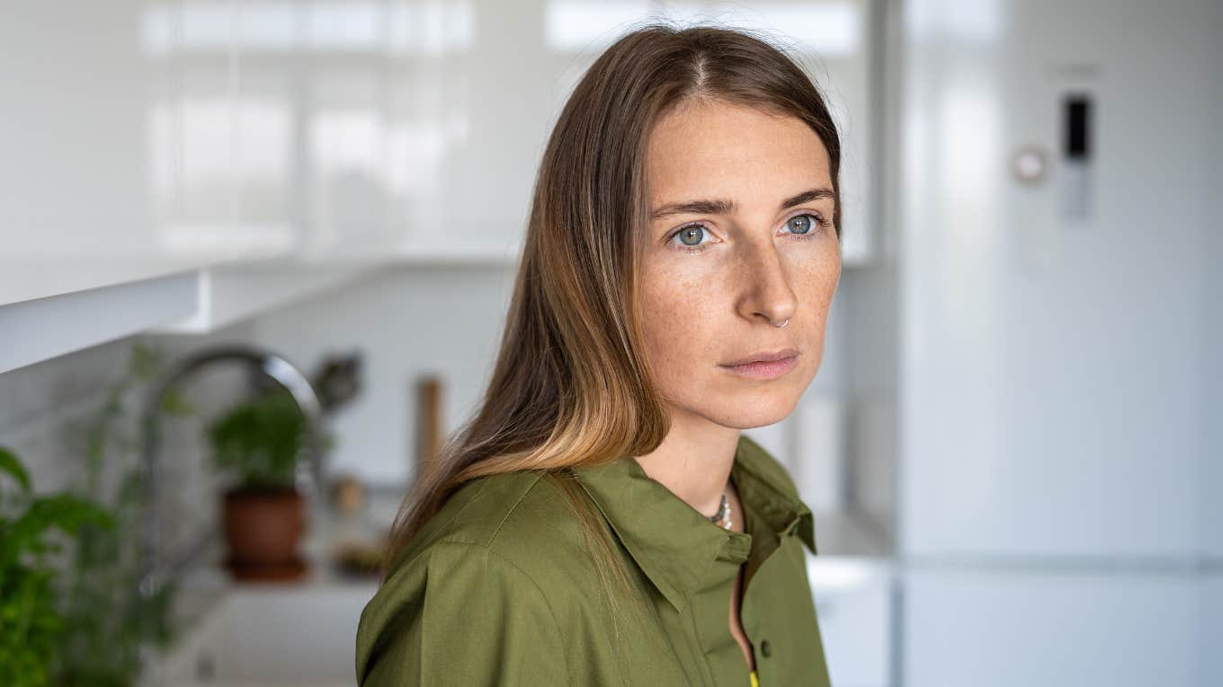 middle aged woman thinking back on being a latchkey kid