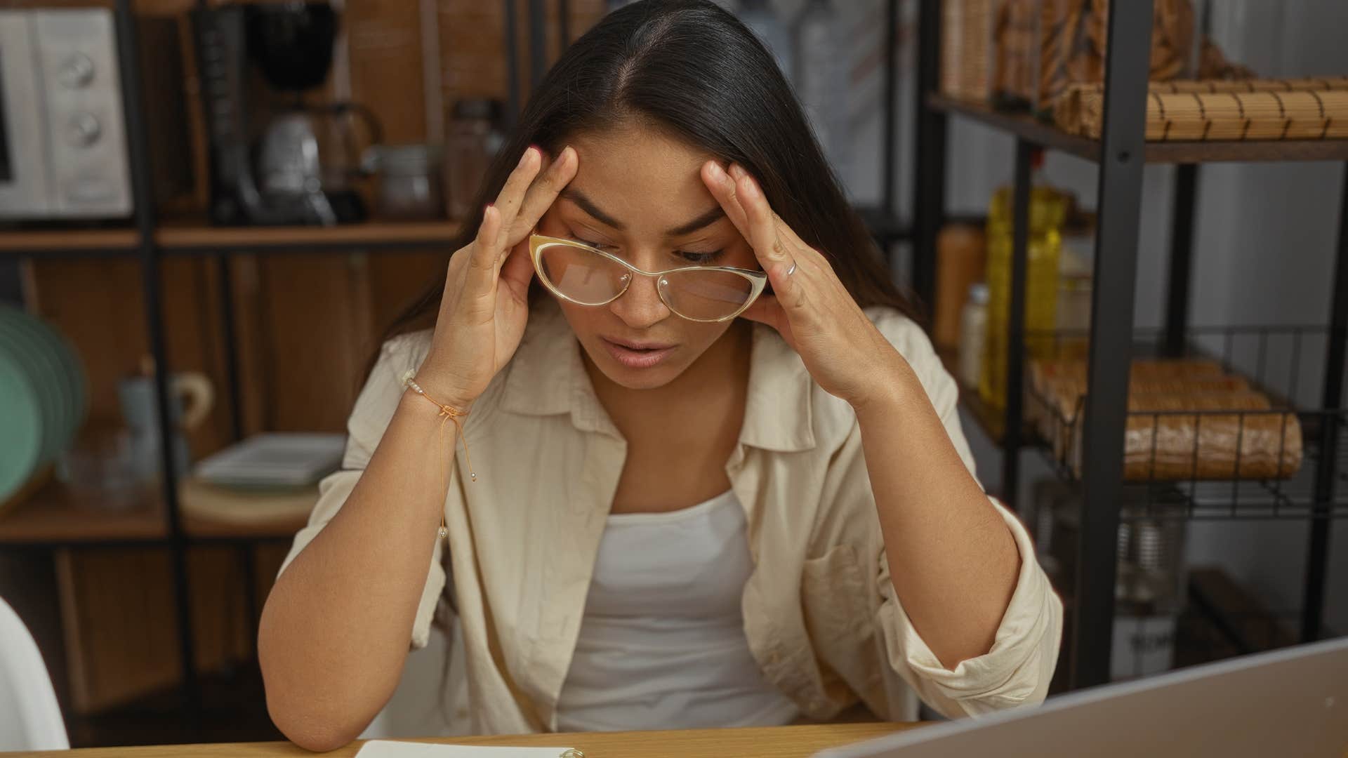 woman who feels things incredibly deeply looking stressed