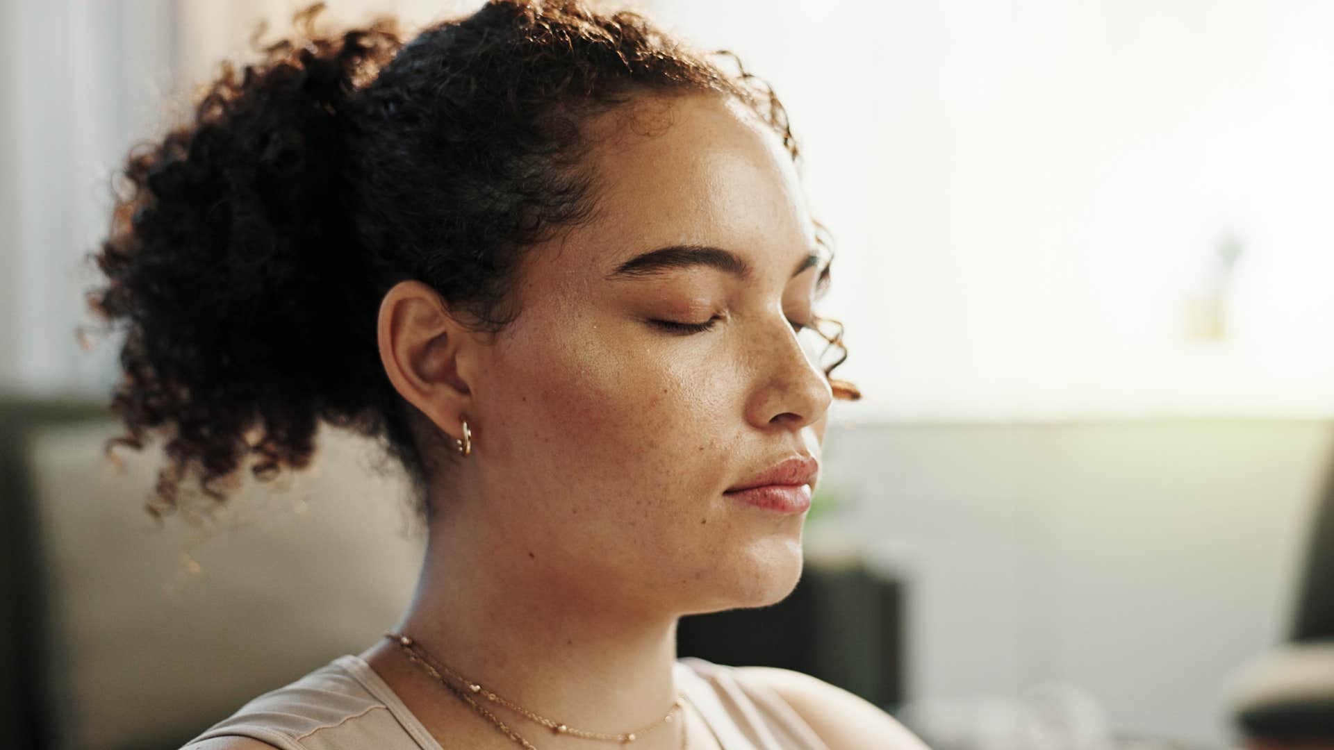 woman with a strong intuition meditating