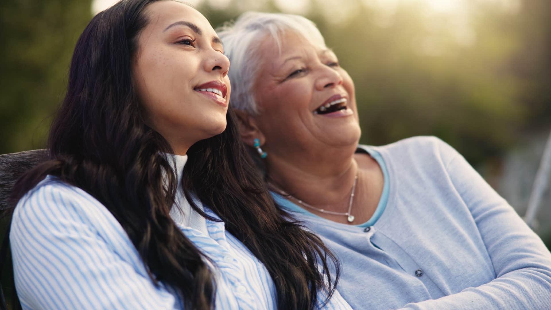 woman who's overly empathetic smiling with her mother