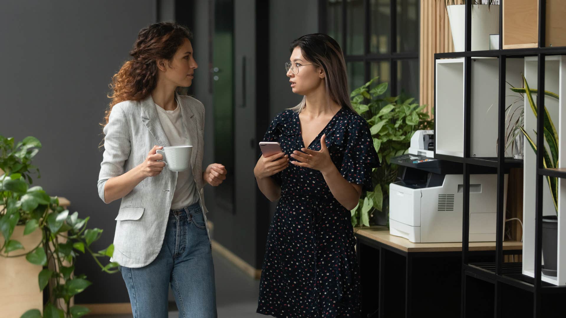 colleagues having a conversation over coffee