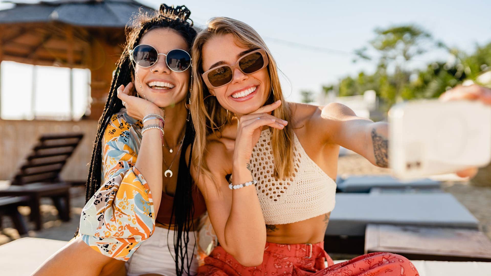 friends taking a selfie and not gossiping