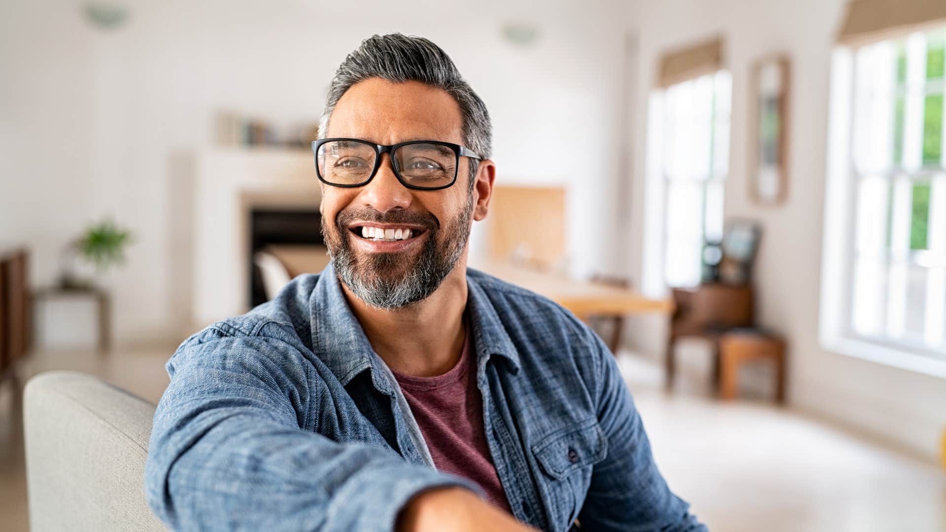 man with a big smile looking happy