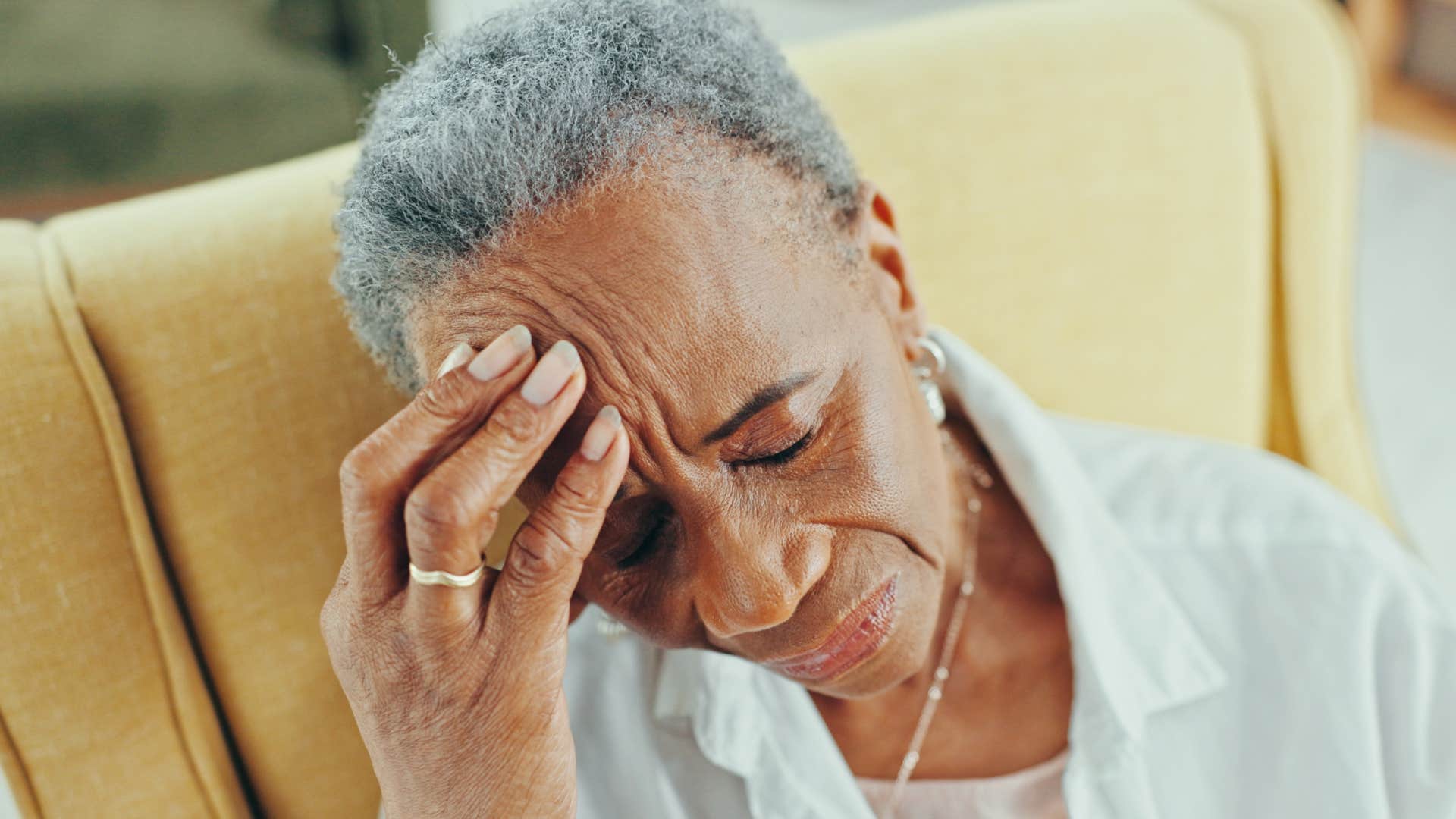 isolated older woman struggling with uncertainty