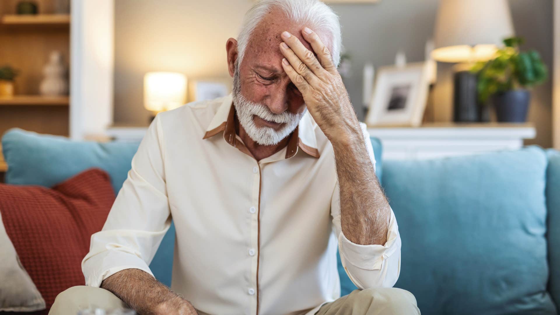 sad older man who's stuck in survival mode at home alone