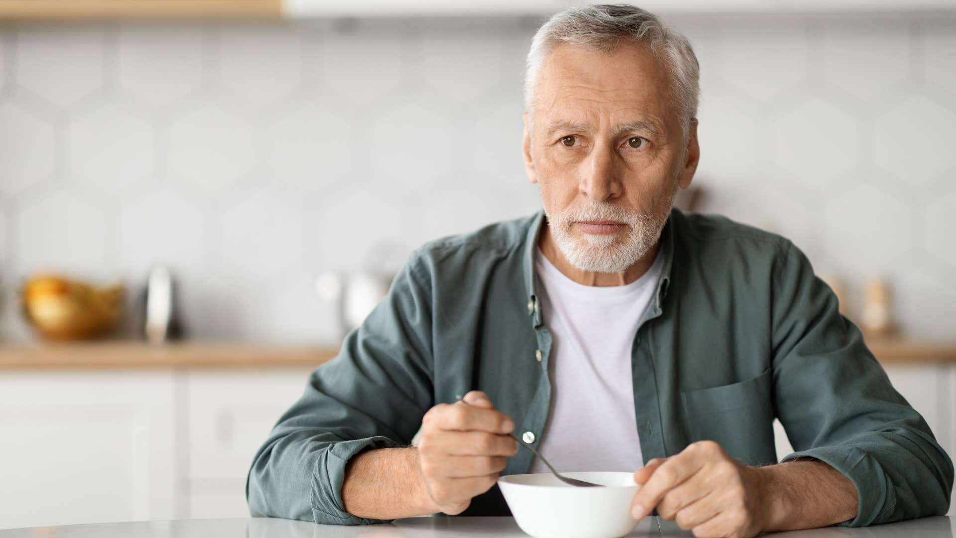 hyper-independent man eating breakfast