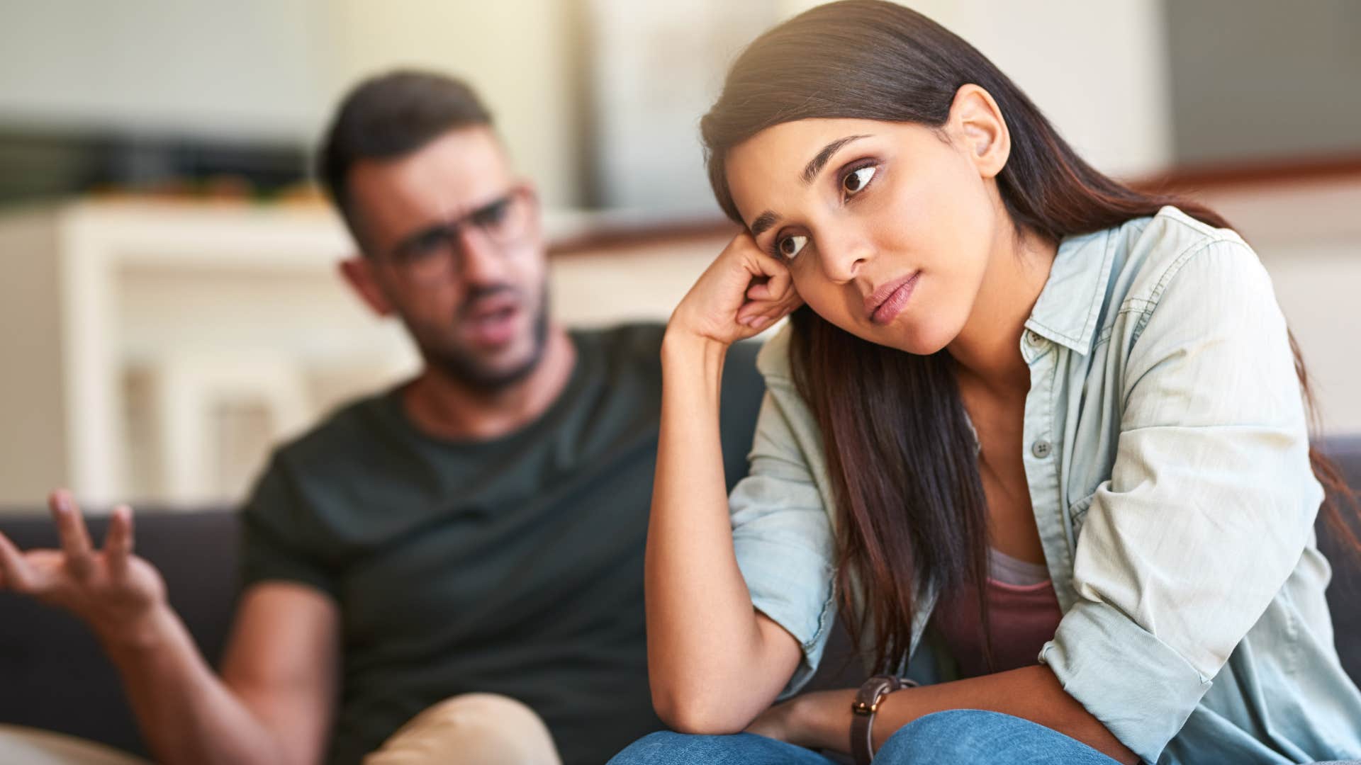 woman keeping a mental note of everything with her husband