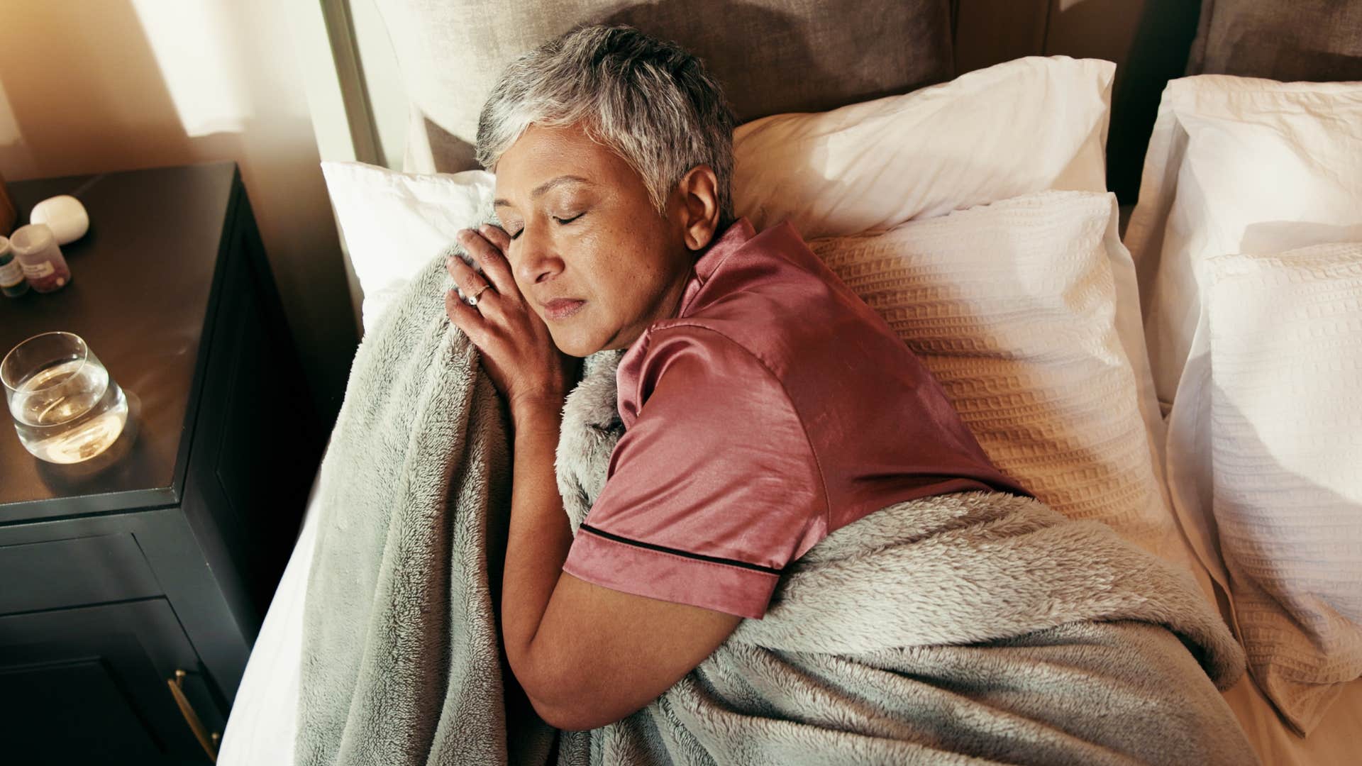 woman who appreciates a ritual and routine asleep in bed