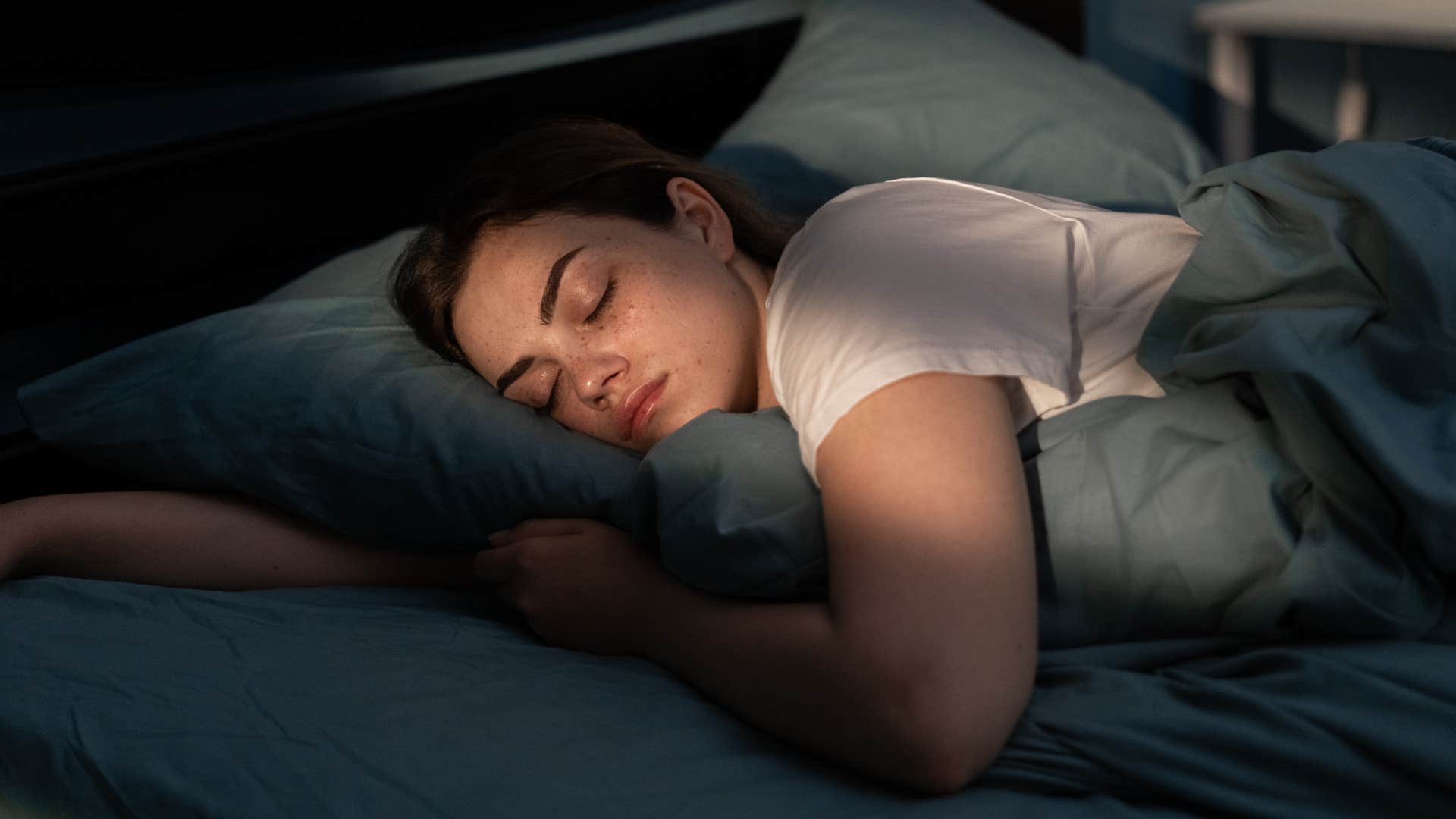 woman who craves comfort sleeping on her stomach