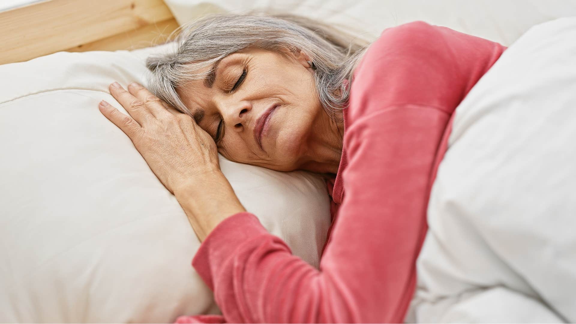 impulsive woman sleeping in her bed