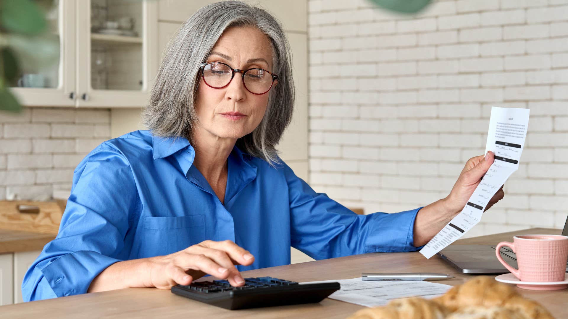 woman who's busy with responsibilities working at home