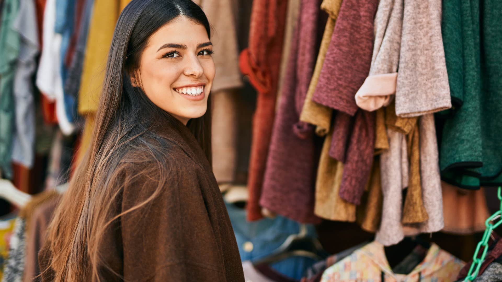 woman smiling while shopping at small business