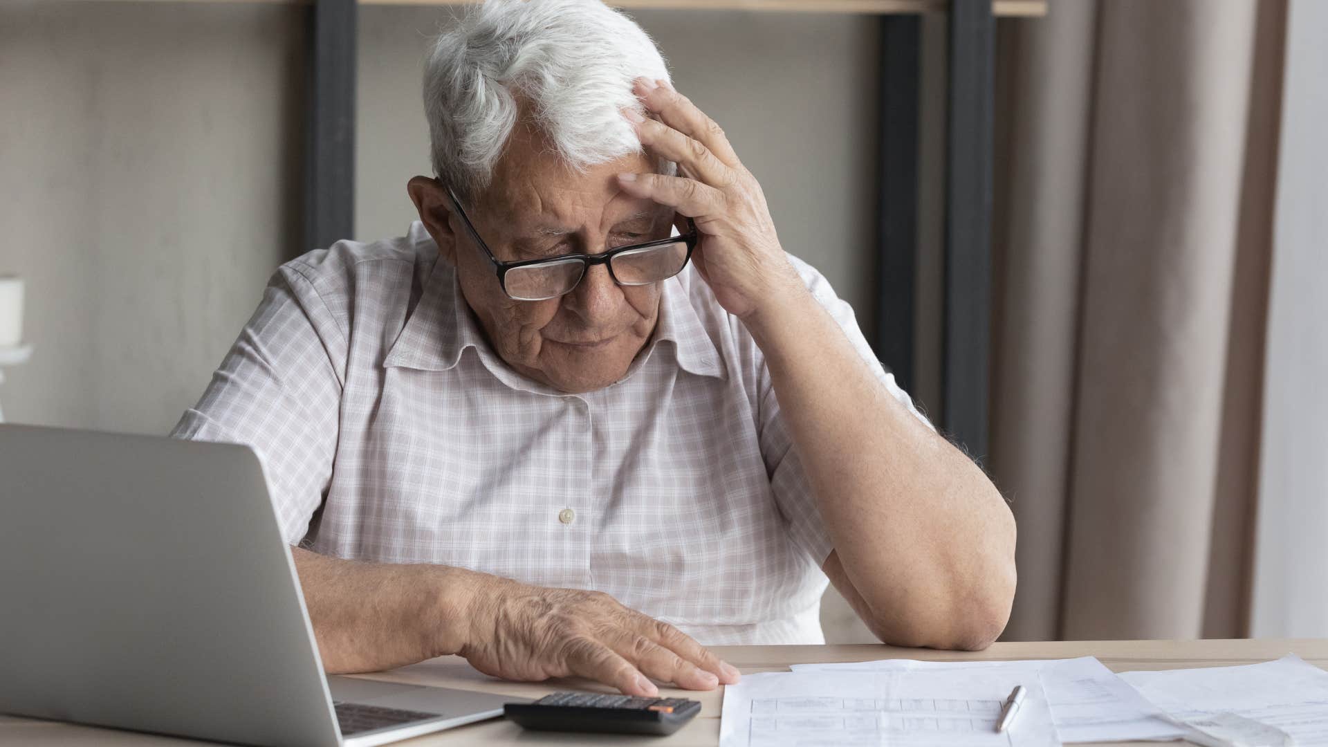 man who thinks financial responsibility is a science doing bills