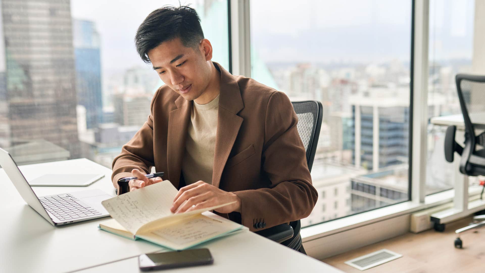man who thinks integrity is important working in an office