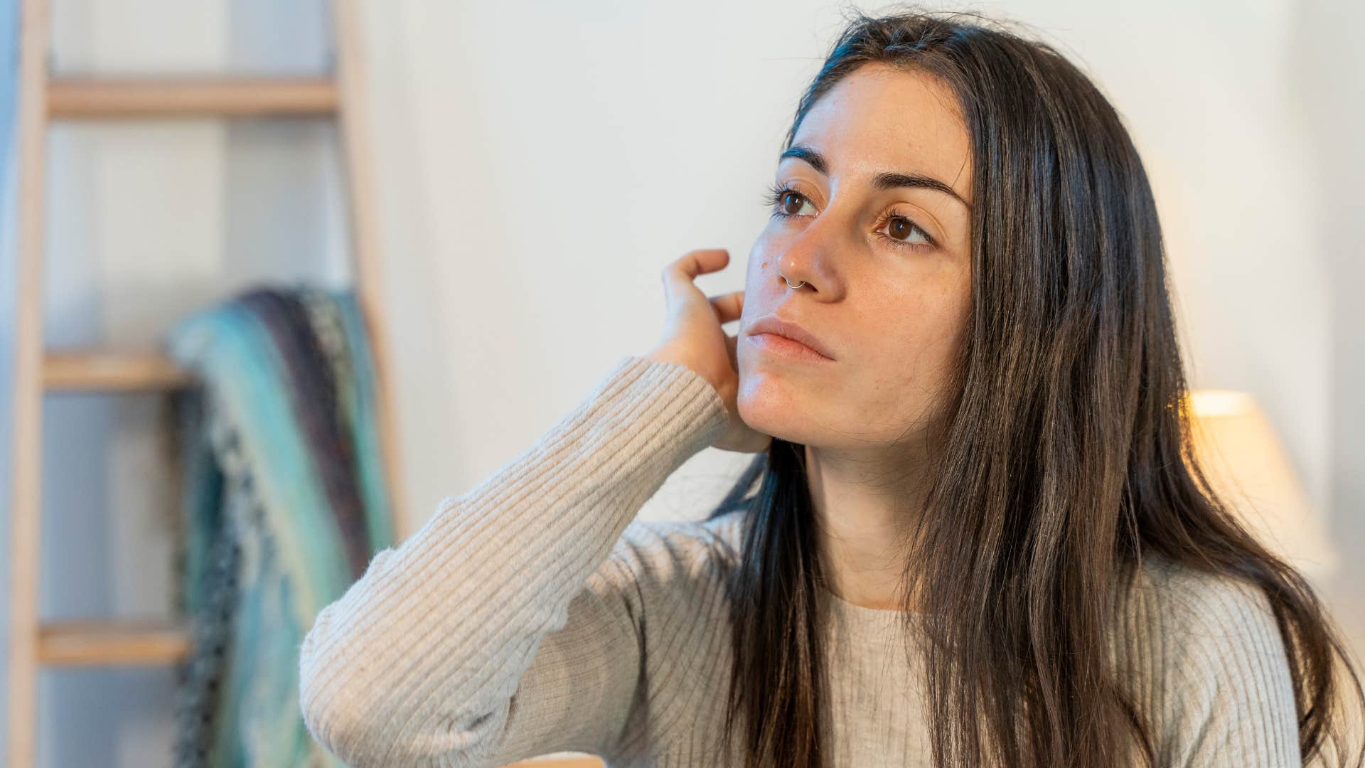 pensive woman yearning for a sense of security