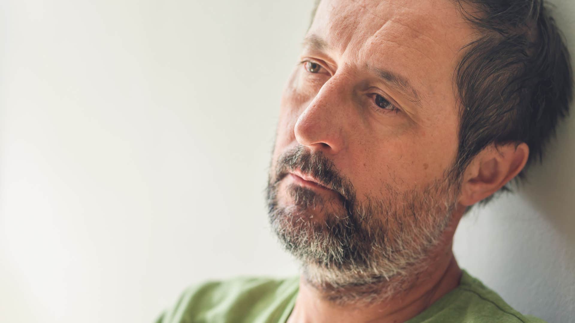 man feeling disconnected from the world around him