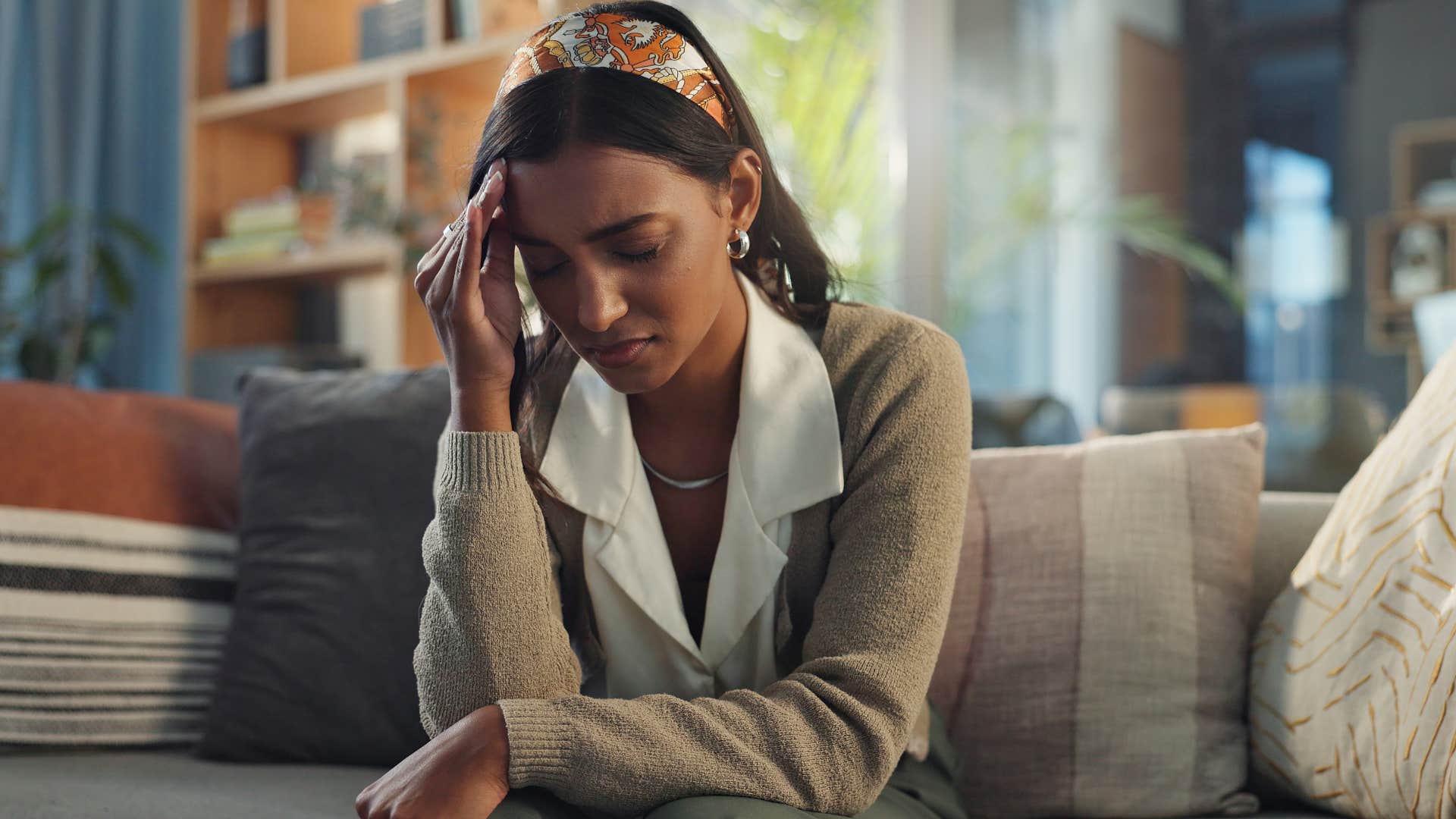 woman feeling overwhelmed by her responsibilities