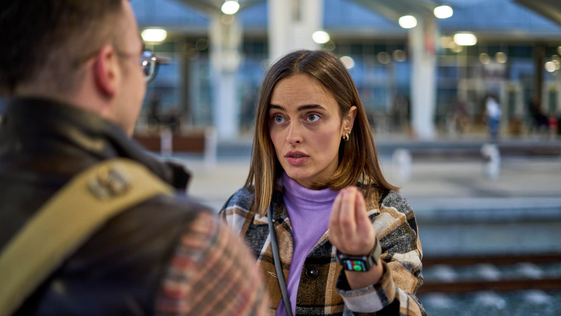 persuasive woman convincing man to side with her