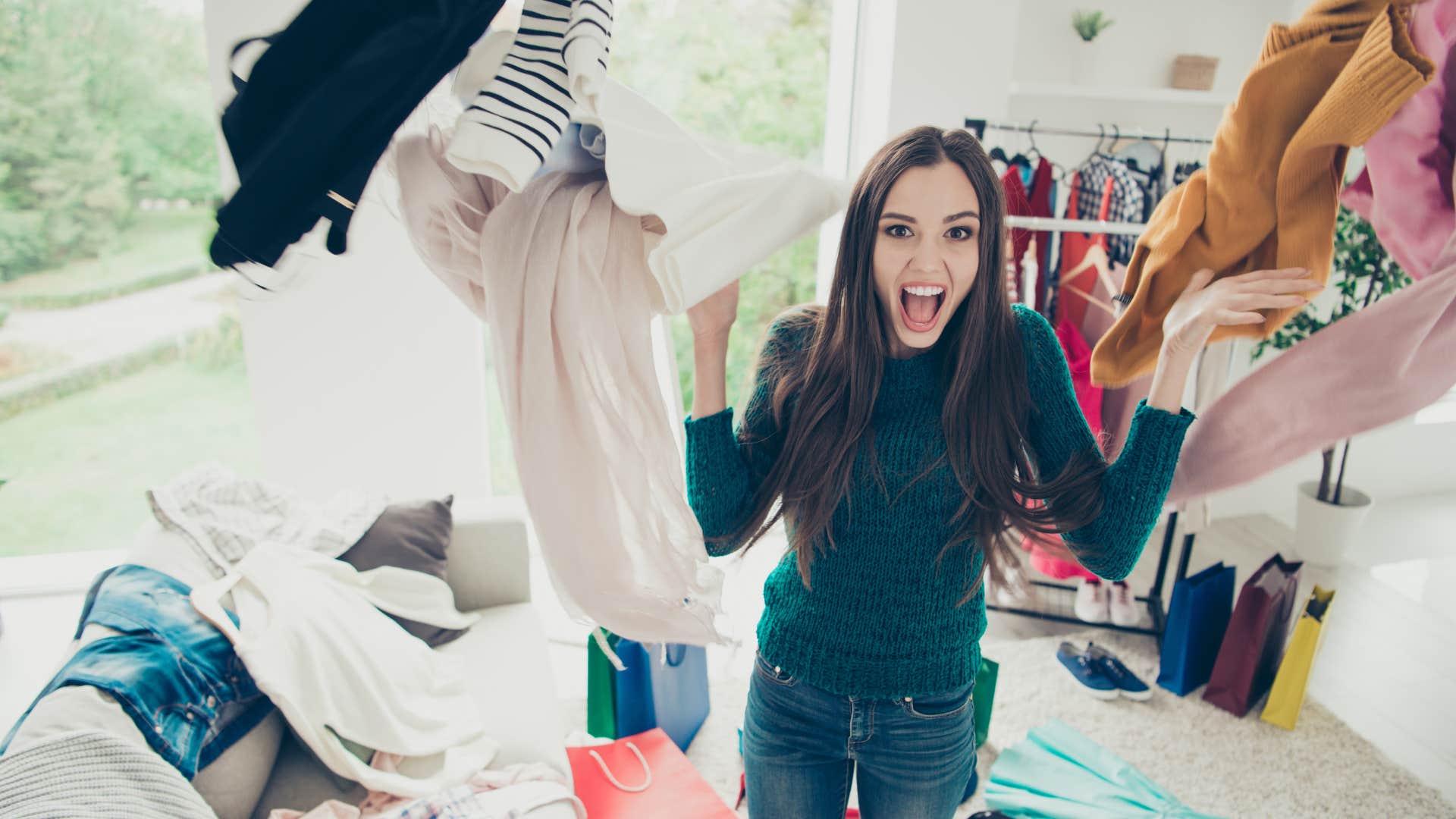 woman in chaotic home surrounded by mess