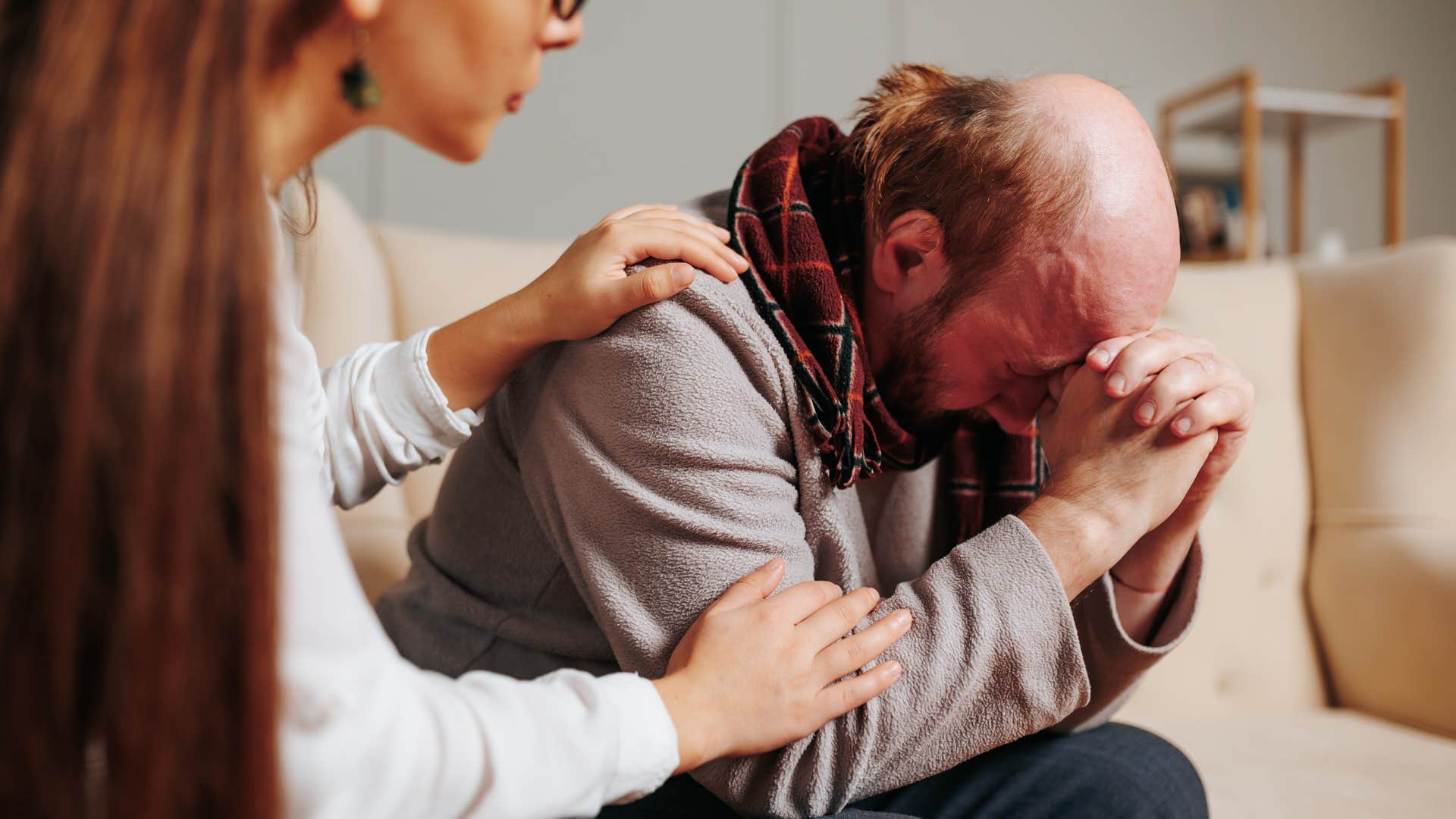 woman telling upset man he needs a thicker skin