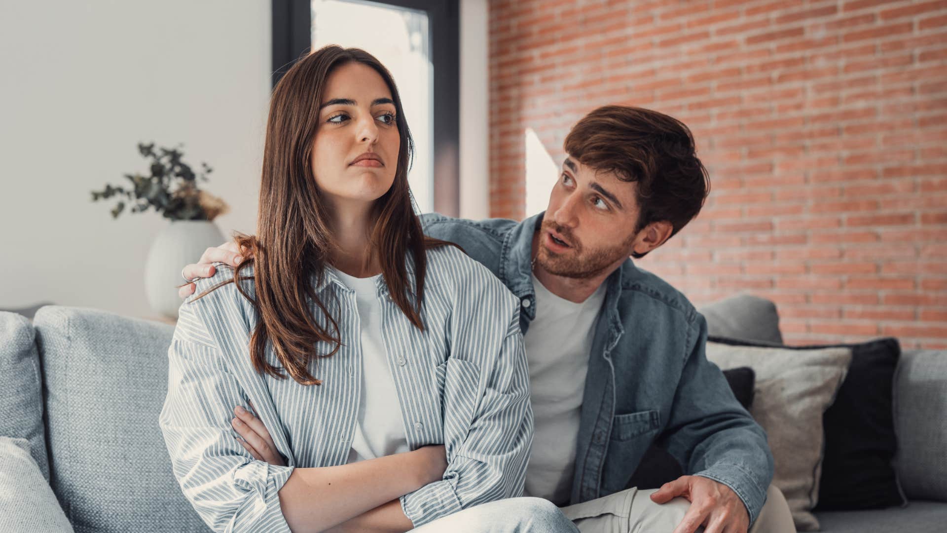 man telling woman shes not invited to event