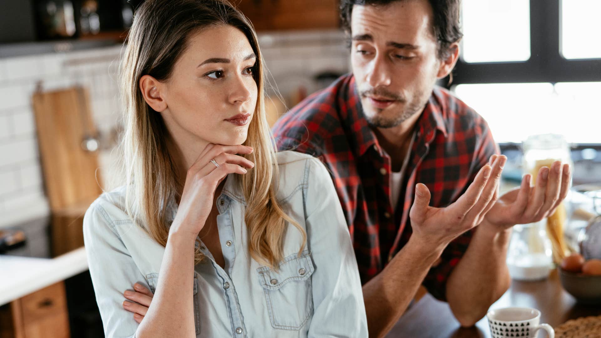 man questioning confused woman