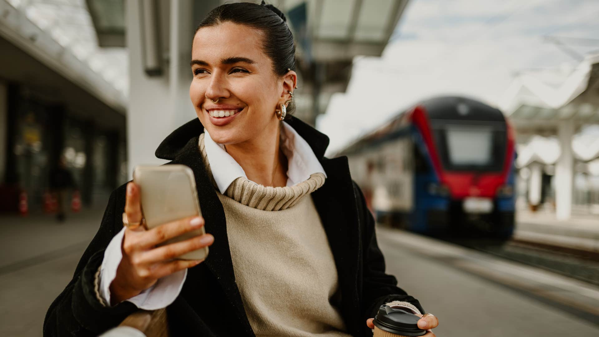 woman flaunting money and material things on her phone