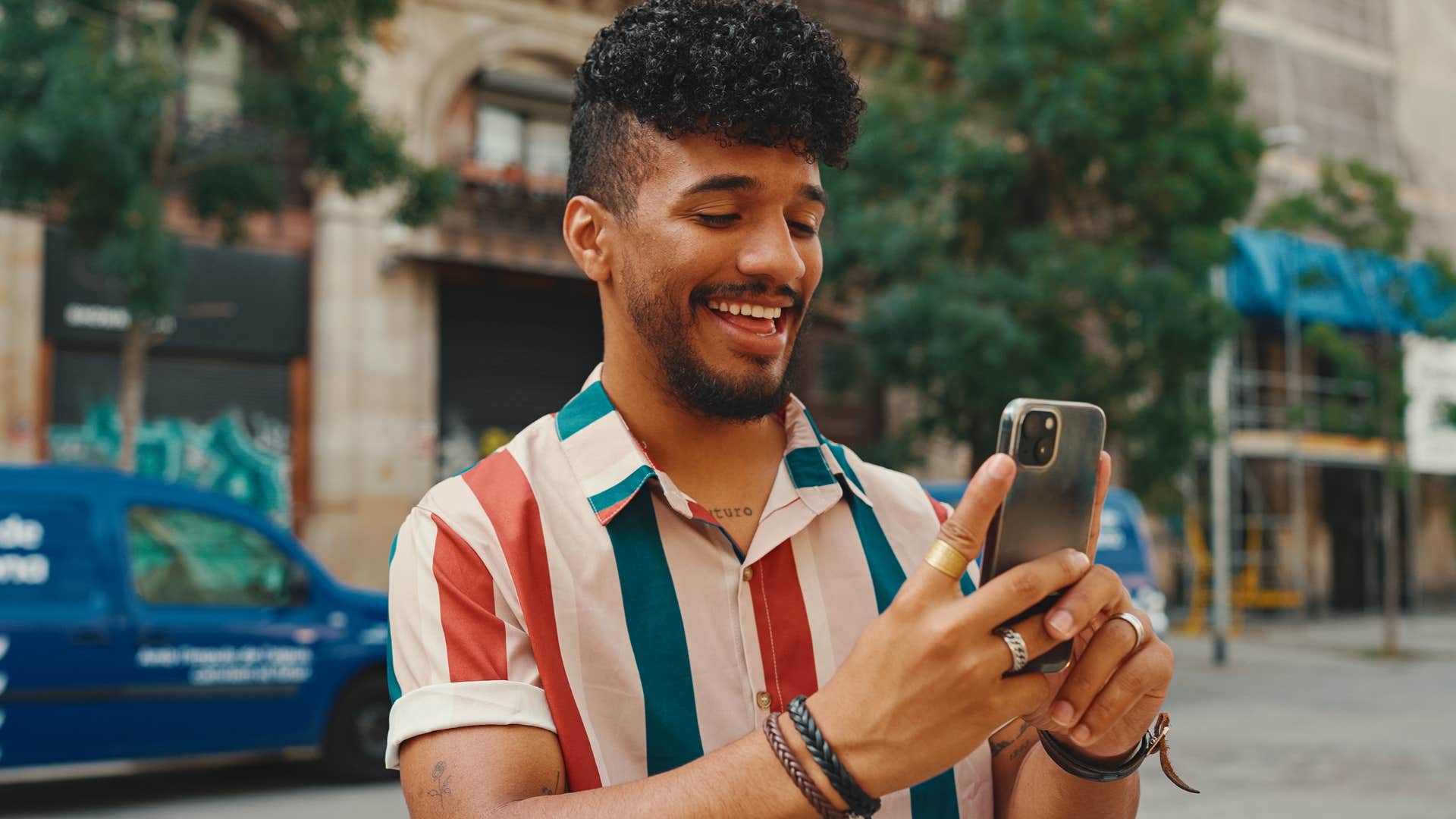 man using self-deprecating humor on his phone