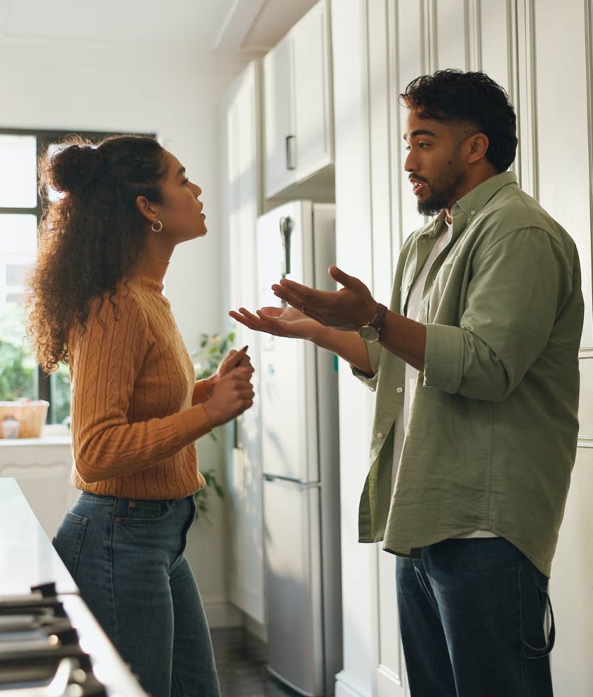 Arguing couple regret being caught in pattern of blame