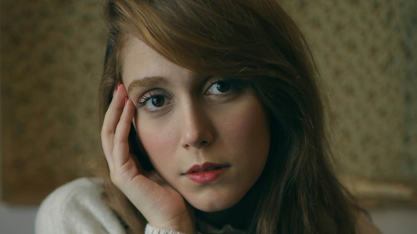 Woman watches true crime before bed.