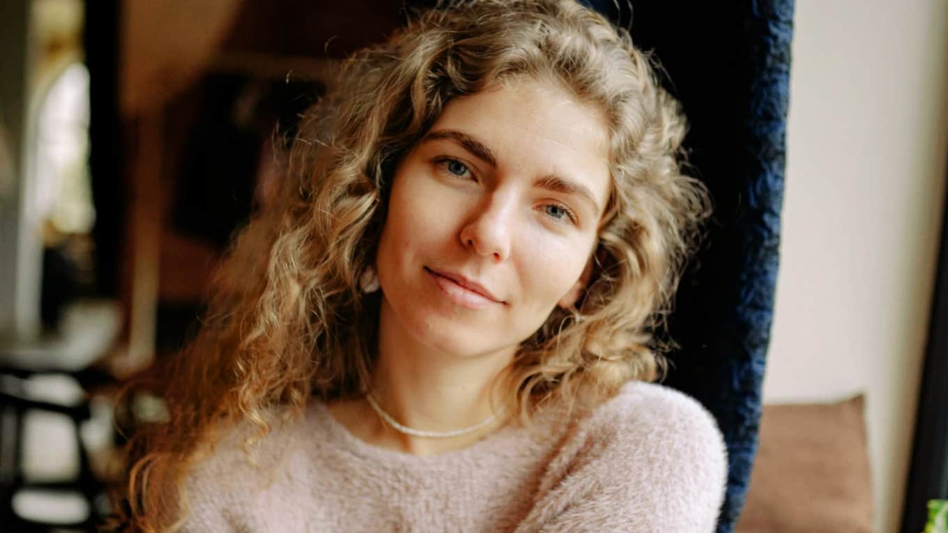 A good wife smiling because she's naturally grateful 