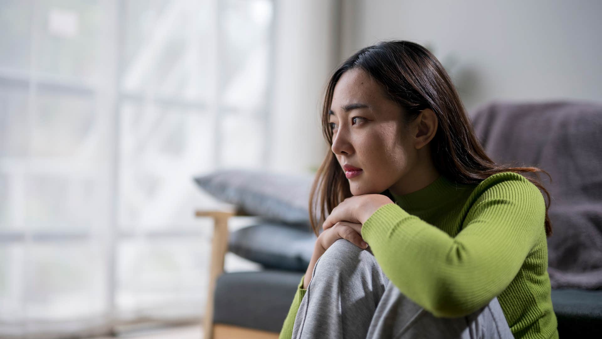 woman who might have a psychic gift as she feels sick and gloomy out of nowhere