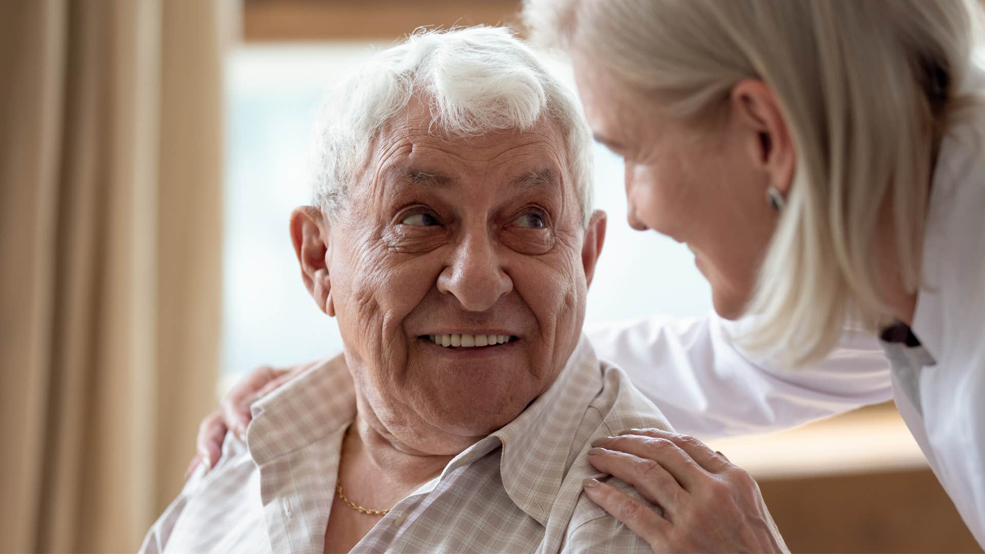 woman giving older man grace without ego