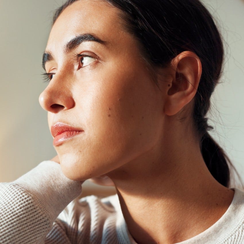 woman who makes life feel more honest by not ignoring pain that's gotten her to this point