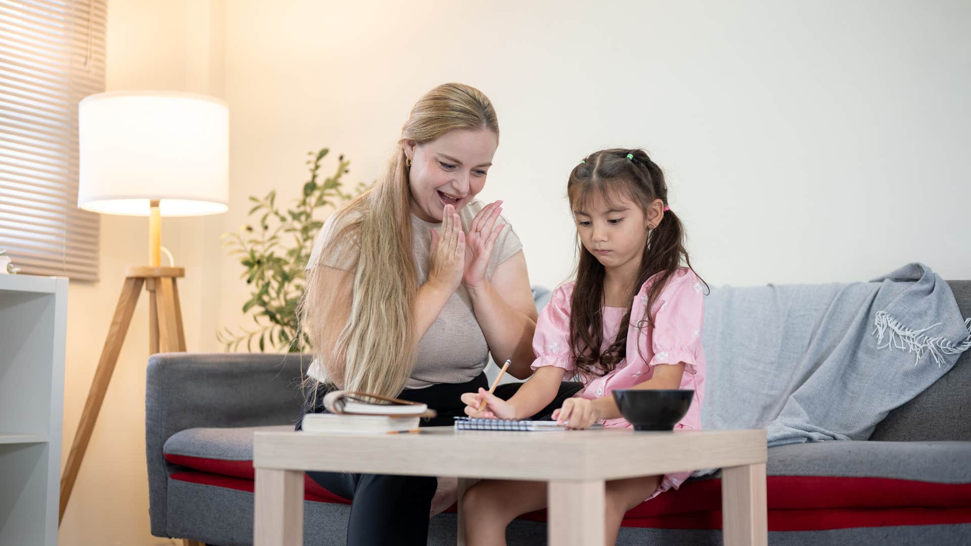 woman who is a naturally good mom as she praises positive things she sees