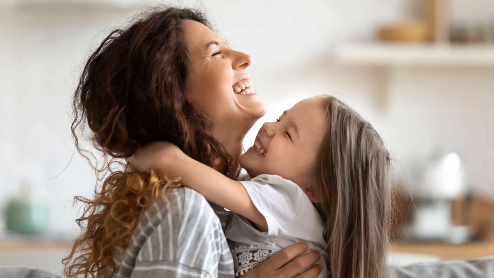 woman who is naturally a good mom as she stops spending time on phone