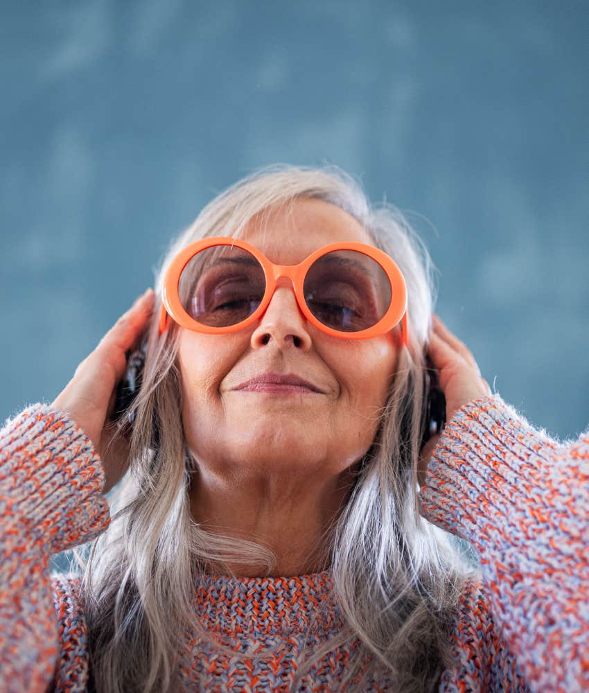 Gracefully ageing person celebrates their relaness