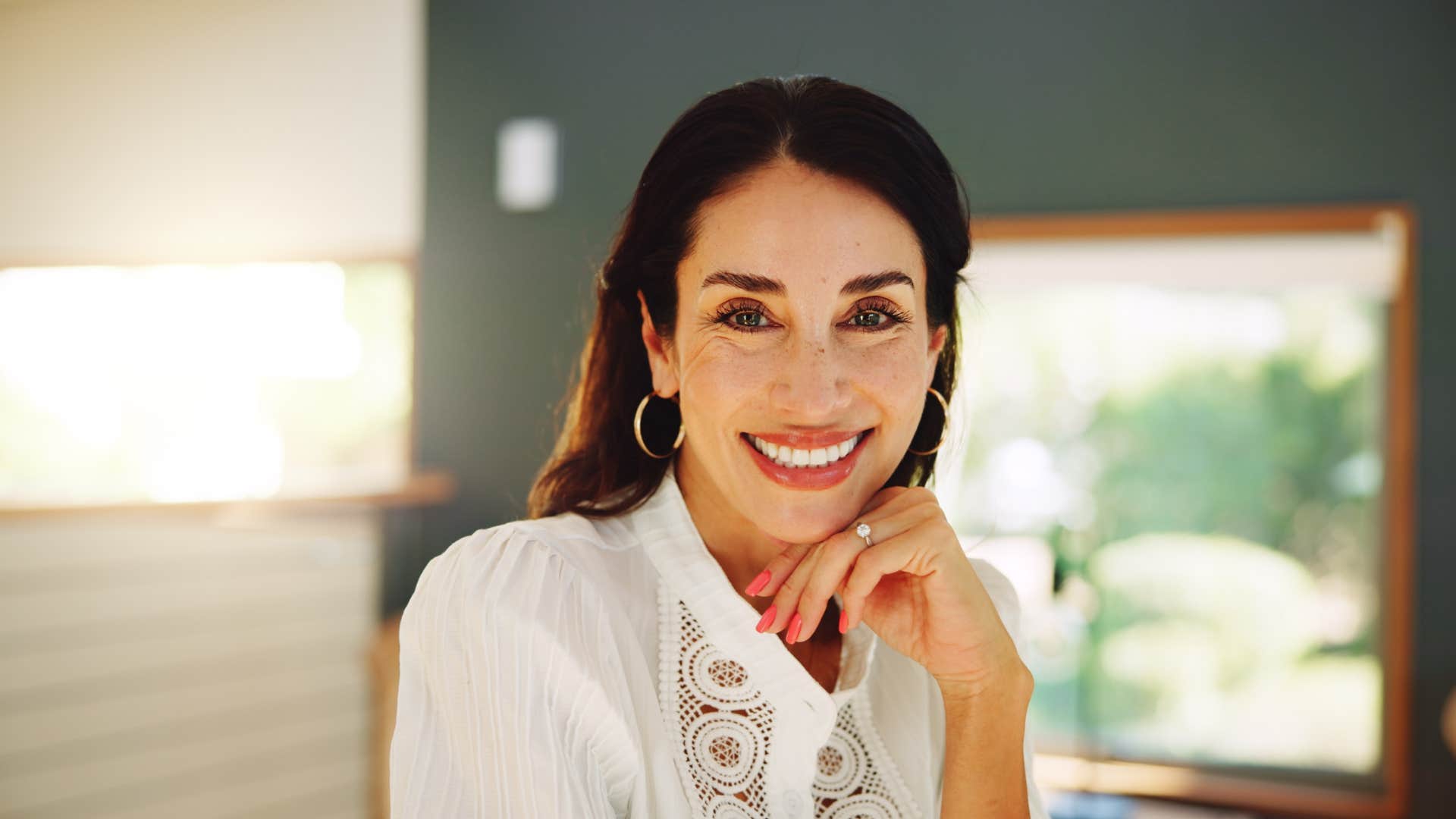 woman who is genuinely satisfied with her life as she has the power