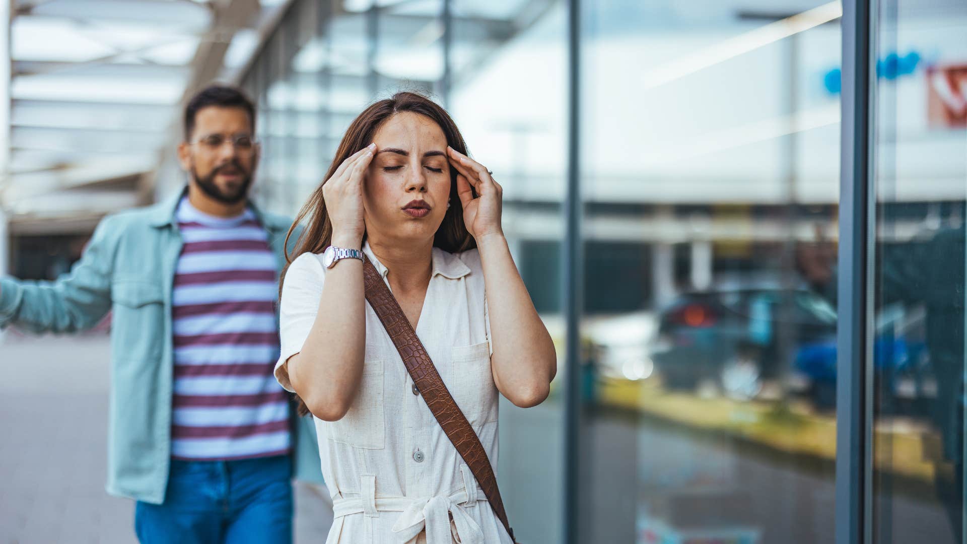 Anxious person excuses themselves from stressful conversation