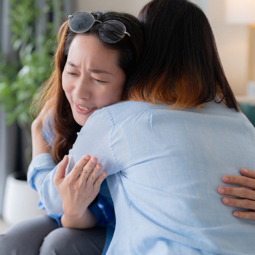 woman who is emotionally mature as she is present during friend's suffering
