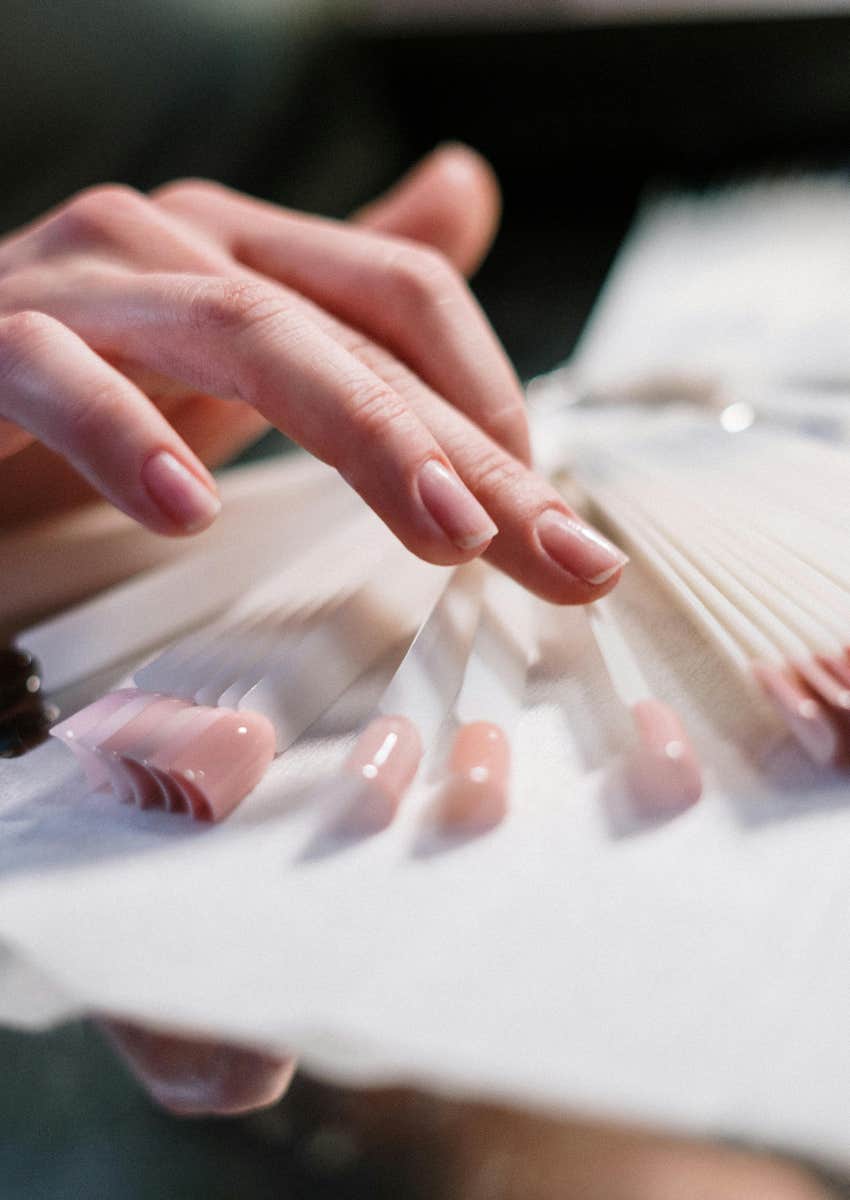 woman who spent extra on getting a manicure