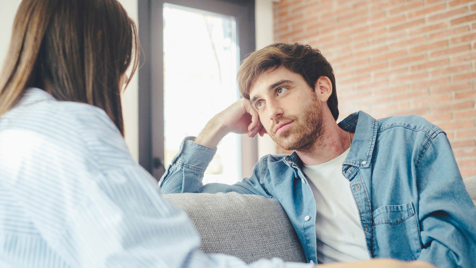 man listening to significant other talk